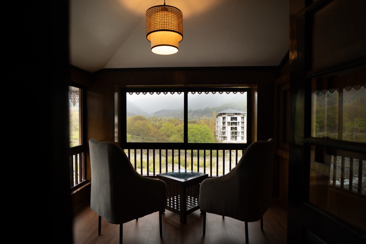 Charming wooden balcony detail of Walnut Village Resort luxury guest rooms