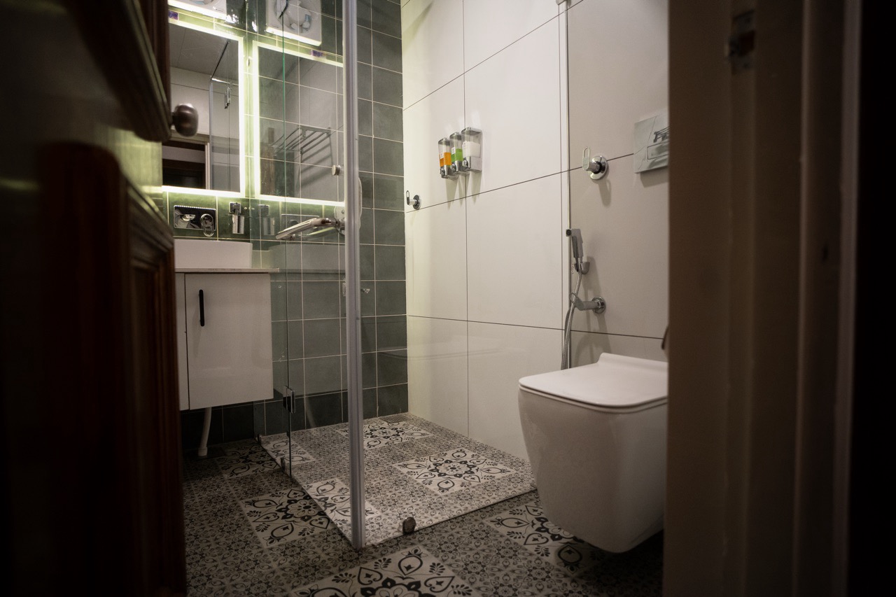 Private balcony of the Riverview Premium room with panoramic views of the flowing Lidder River and surrounding hills